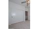 Bedroom with double sliding doors leading to a spacious closet at 10350 W Alvarado Rd, Avondale, AZ 85392