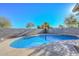 Stunning kidney-shaped pool with a spacious patio area at 10350 W Alvarado Rd, Avondale, AZ 85392