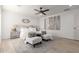 Relaxing bedroom with light wood floors and a calm color palette at 1829 E Amelia Ave, Phoenix, AZ 85016