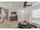 Living area with light flooring, a comfy couch, and a coffee table at 1829 E Amelia Ave, Phoenix, AZ 85016