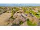 Aerial view of a house with a pool and landscaped yard at 2090 E Coconino Ct, Gilbert, AZ 85298