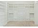 Large walk-in closet with ample shelving and drawers at 2090 E Coconino Ct, Gilbert, AZ 85298