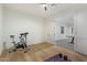 Home gym with exercise bike, yoga mat, and view of game room at 2090 E Coconino Ct, Gilbert, AZ 85298