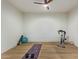 Home gym with exercise bike, yoga mat, and free weights at 2090 E Coconino Ct, Gilbert, AZ 85298