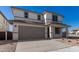 Two-story house with attached garage and desert landscaping at 31730 N Waddle Ln, San Tan Valley, AZ 85143