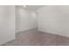 Clean hallway with gray tile floors and white walls at 31730 N Waddle Ln, San Tan Valley, AZ 85143