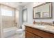 Clean bathroom with granite countertop, single sink and bathtub at 3236 E Chandler Blvd # 2033, Phoenix, AZ 85048