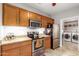 Modern kitchen with stainless steel appliances and granite countertops at 3236 E Chandler Blvd # 2033, Phoenix, AZ 85048