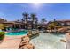 Inviting pool and spa area with lounge chairs and landscaping at 3236 E Chandler Blvd # 2033, Phoenix, AZ 85048