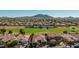 Luxury home community; golf course, lake, mountains in background at 3415 E Sports Dr, Gilbert, AZ 85298