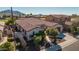 Single-story home with a two-car garage and desert landscaping at 3415 E Sports Dr, Gilbert, AZ 85298