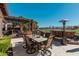 Outdoor patio with seating area, pergola, and mountain views at 3415 E Sports Dr, Gilbert, AZ 85298