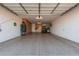 Spacious two-car garage with epoxy flooring and storage at 3415 E Sports Dr, Gilbert, AZ 85298