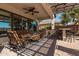 Spacious covered patio with seating and ceiling fan at 3415 E Sports Dr, Gilbert, AZ 85298