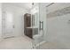 Clean bathroom with walk-in shower and a private door at 4547 S Banning Dr, Gilbert, AZ 85297