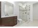 Bright bathroom with walk-in shower and double sinks at 4547 S Banning Dr, Gilbert, AZ 85297