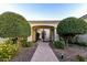 Elegant entry gate with lush landscaping and walkway at 4547 S Banning Dr, Gilbert, AZ 85297