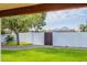 Landscaped backyard with grassy area, wooden gate, and mountain view at 6262 N 85Th St, Scottsdale, AZ 85250