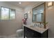 Clean bathroom with marble vanity, subway tile, and updated fixtures at 6262 N 85Th St, Scottsdale, AZ 85250