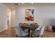 Bright dining area with a round table and four gray chairs at 6262 N 85Th St, Scottsdale, AZ 85250