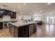 Open concept kitchen with large island and wine cooler at 6262 N 85Th St, Scottsdale, AZ 85250