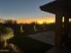 Evening view of backyard patio and landscape at 9515 E Sundance Trl, Scottsdale, AZ 85262