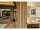 Bathroom with courtyard view and modern vanity at 9515 E Sundance Trl, Scottsdale, AZ 85262