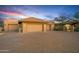 Three-car garage with paver driveway offering ample parking space at 9515 E Sundance Trl, Scottsdale, AZ 85262