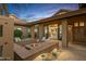 Inviting patio with fire pit and seating area at 9515 E Sundance Trl, Scottsdale, AZ 85262