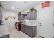 Laundry room with built-in cabinets and storage at 97 E Alcatara Ave, San Tan Valley, AZ 85140