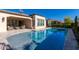 Inviting rectangular pool with a large patio area at 97 E Alcatara Ave, San Tan Valley, AZ 85140