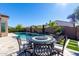 Inviting pool area with patio furniture at 97 E Alcatara Ave, San Tan Valley, AZ 85140