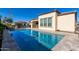 Relaxing rectangular pool in a backyard oasis at 97 E Alcatara Ave, San Tan Valley, AZ 85140