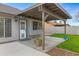 Relaxing patio area with covered pergola, creating a shaded outdoor space at 1337 N Rosemont --, Mesa, AZ 85205