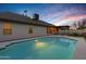 Peaceful backyard pool scene at sunset, ideal for relaxation at 1337 N Rosemont --, Mesa, AZ 85205