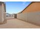 Landscaped side yard with a concrete patio and gated access at 1337 N Rosemont --, Mesa, AZ 85205