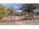 Backyard with a metal fence and a stone pathway at 30247 N 164Th St, Scottsdale, AZ 85262