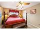 Bright bedroom with a wooden bed frame and ample closet space at 30247 N 164Th St, Scottsdale, AZ 85262