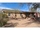 Ranch-style home with covered patio and desert landscaping at 30247 N 164Th St, Scottsdale, AZ 85262