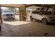 Two-car garage with shelving and room for two vehicles at 30247 N 164Th St, Scottsdale, AZ 85262