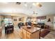 Open concept kitchen with island and stainless steel appliances at 30247 N 164Th St, Scottsdale, AZ 85262