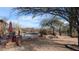 Round pool with a pergola, mountain views, and desert landscaping at 30247 N 164Th St, Scottsdale, AZ 85262