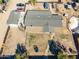 Aerial view of the home showing roof, covered patio, fence, trampoline and backyard at 3740 E Edna Ave, Phoenix, AZ 85032