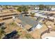 Aerial view of the home showing roof, covered patio, fence, and backyard at 3740 E Edna Ave, Phoenix, AZ 85032