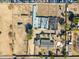 Expansive aerial view showcases the property's layout, surrounding land, and proximity to parking at 3740 E Edna Ave, Phoenix, AZ 85032