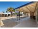 Covered patio with concrete floor, desert landscaping, and a view of the backyard at 3740 E Edna Ave, Phoenix, AZ 85032