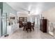 Elegant dining room featuring a classic table set and ample natural lighting at 3740 E Edna Ave, Phoenix, AZ 85032