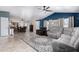 Open-concept living room with a seamless flow between the seating area and dining space at 3740 E Edna Ave, Phoenix, AZ 85032