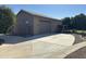 Spacious detached garage with large door and driveway at 3835 E Leland St, Mesa, AZ 85215