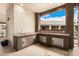 Cozy outdoor kitchen featuring stainless steel storage, sink, and a backyard view at 3835 E Leland St, Mesa, AZ 85215